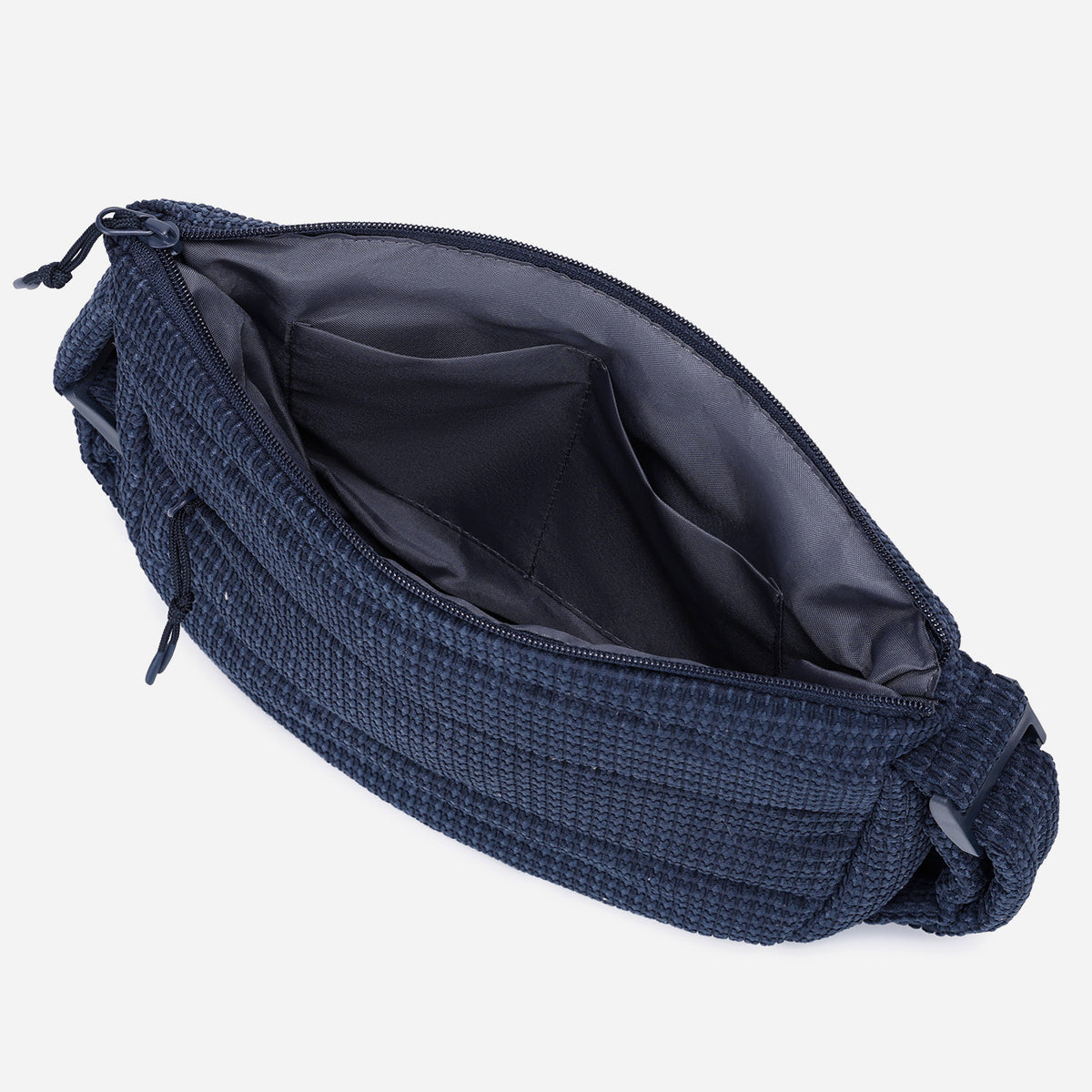 A dark navy blue woven Corduroy Puff shoulder bag by Dude & Bestie Winter 2026