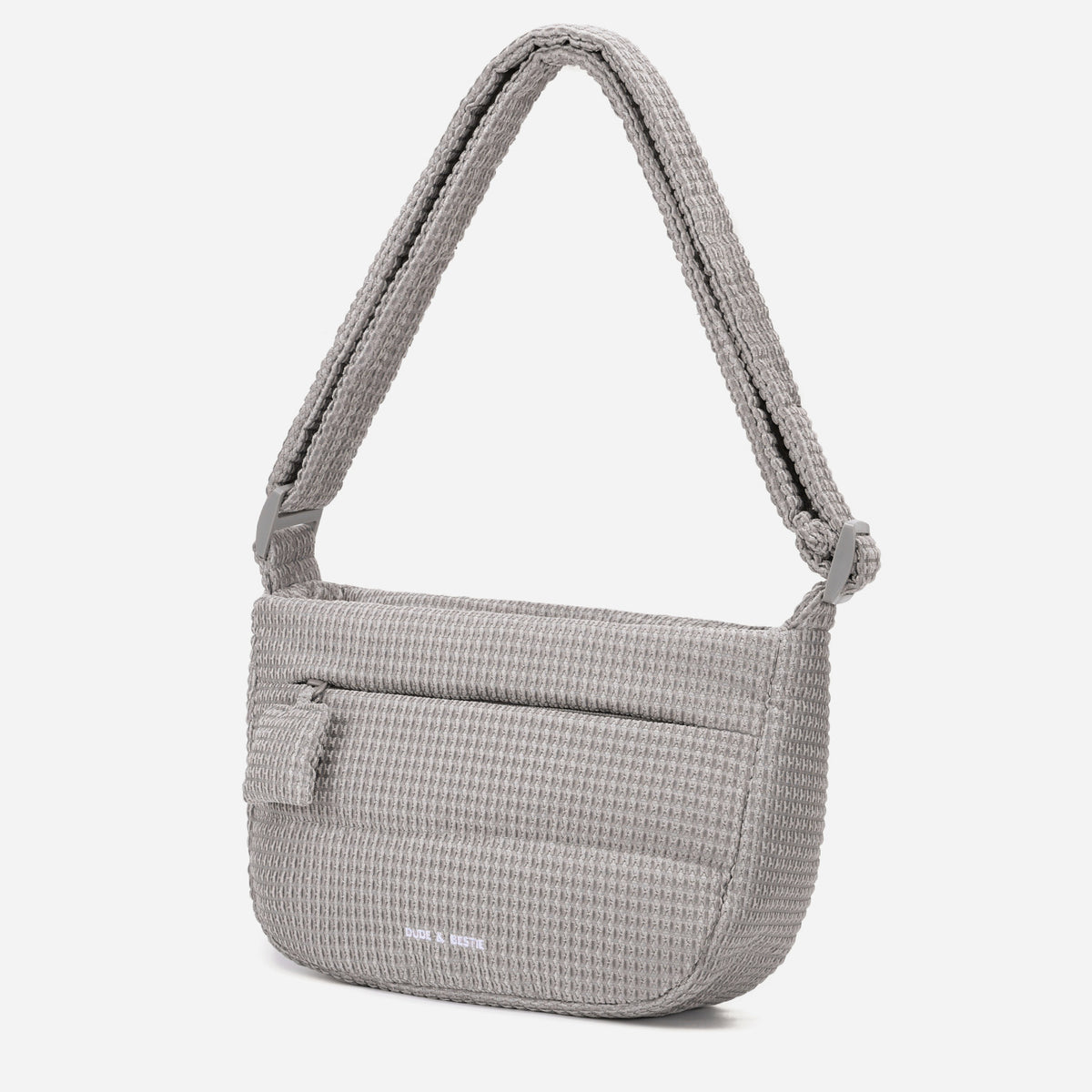 A light gray woven Corduroy Puff shoulder bag by Dude & Bestie Winter2026