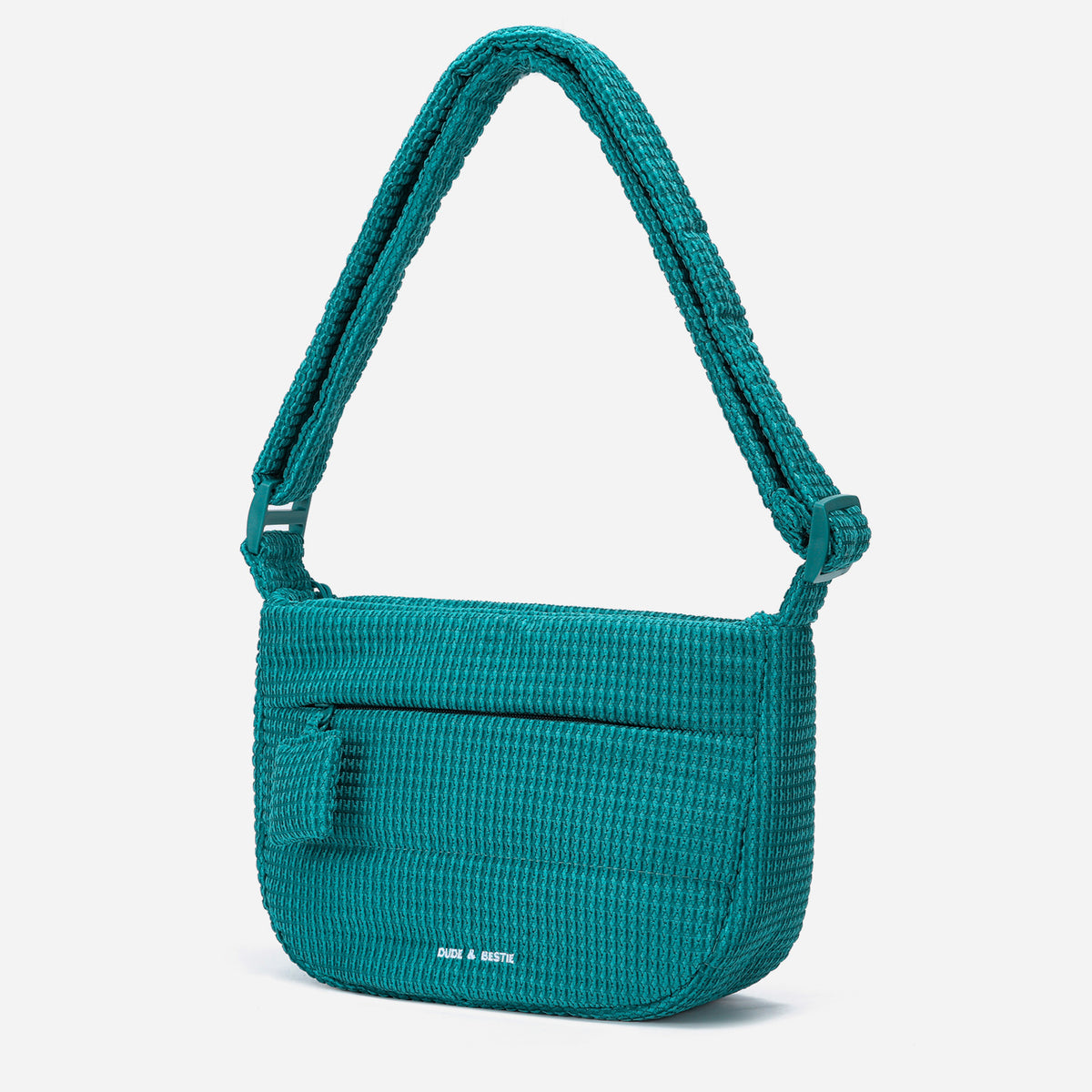 A teal color woven Corduroy Puff shoulder bag by Dude & Bestie Winter 2026