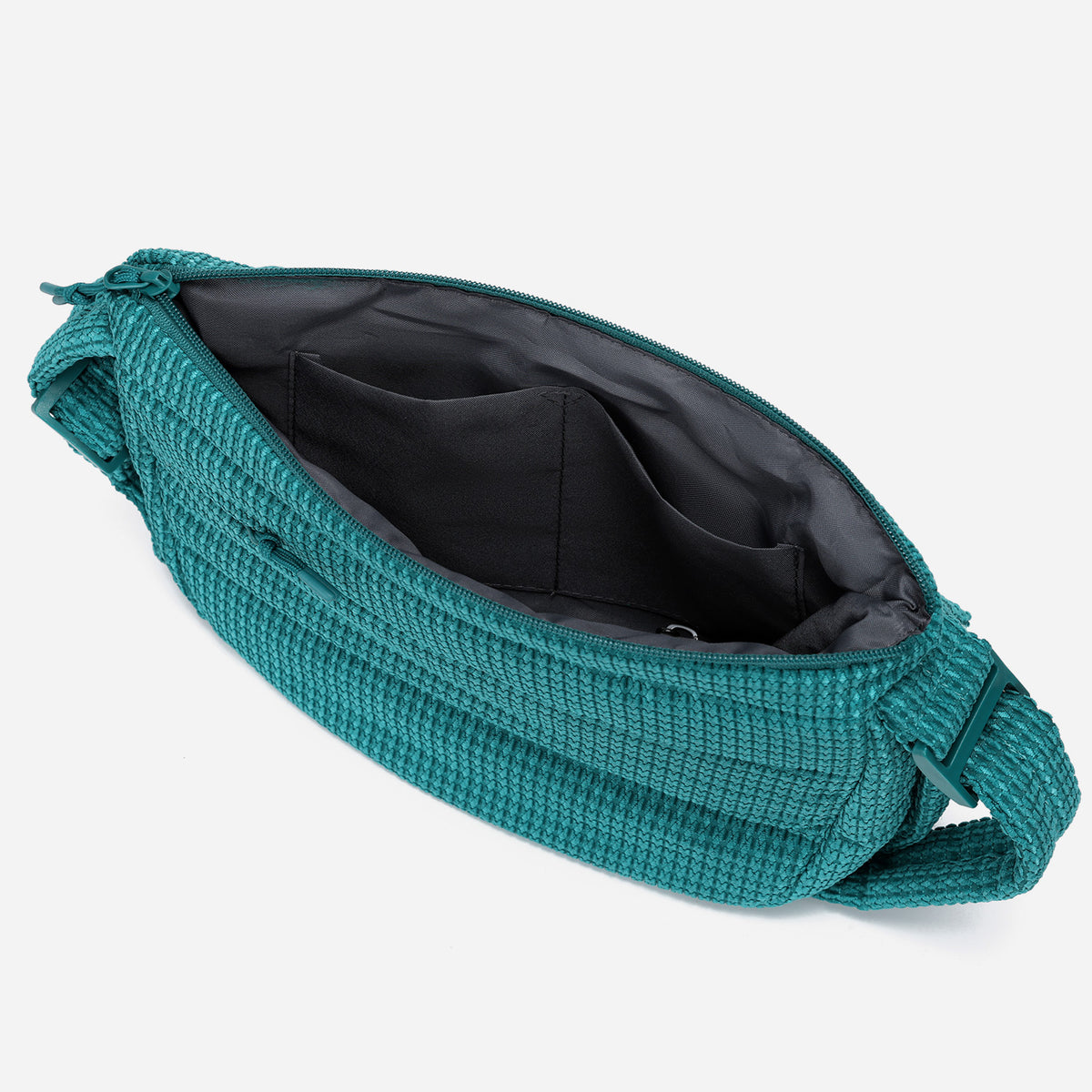 A teal color woven Corduroy Puff shoulder bag by Dude & Bestie Winter 2026