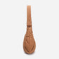 A Mocha brown puffer shoulder croissant bag by dude & bestie
