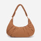 A Mocha brown puffer shoulder croissant bag by dude & bestie