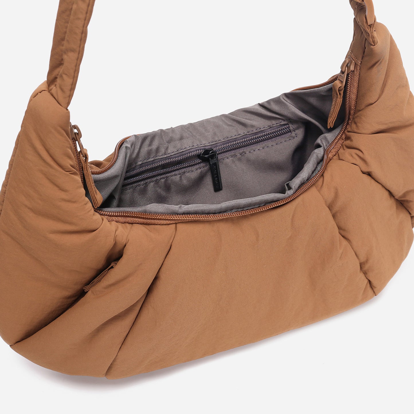 A Mocha brown puffer shoulder croissant bag by dude & bestie