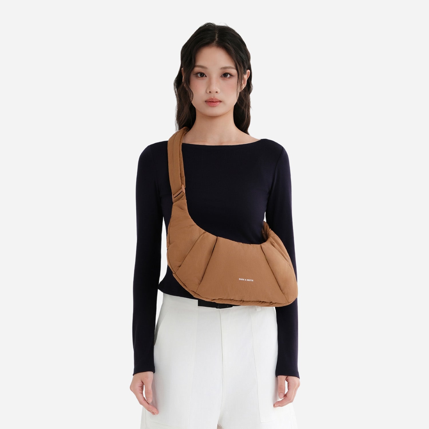 A Mocha brown puffer shoulder croissant bag by dude & bestie