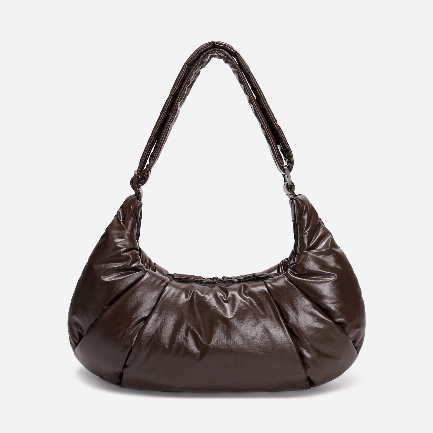 A dark brown shiny Croissant-shaped shoulder bag in polish brown color by Dude & Bestie