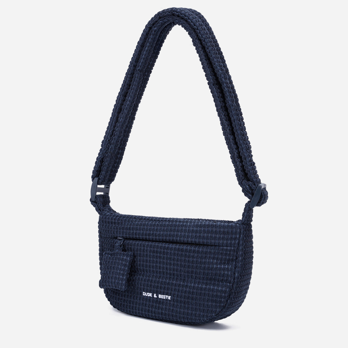 A Dark Navy woven corduroy shoulder bag by Dude & Bestie Winter 2026 Series