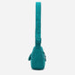 A teal woven corduroy shoulder bag by Dude & Bestie Winter 2026 Series