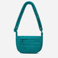 A teal woven corduroy shoulder bag by Dude & Bestie Winter 2026 Series